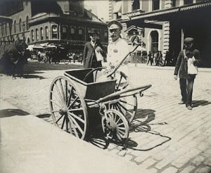 This image is a vintage NYC street sweeper